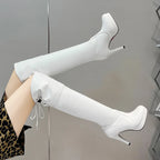 Bottes cuissardes à talons hauts